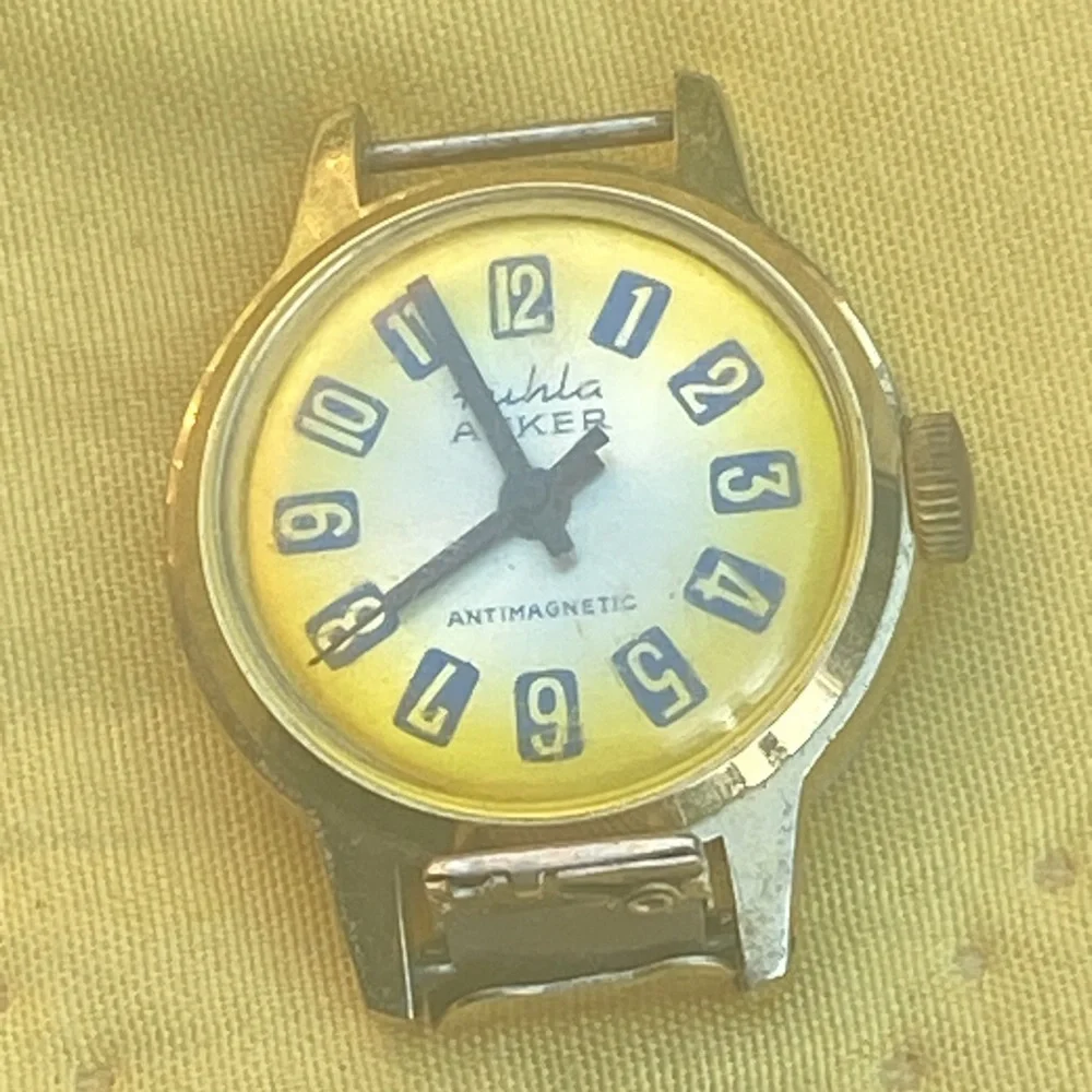 RUHLA ELECTRONICALLY-TIMED AUTOMATIC ANTI-MAGNETIC DATE WATCH